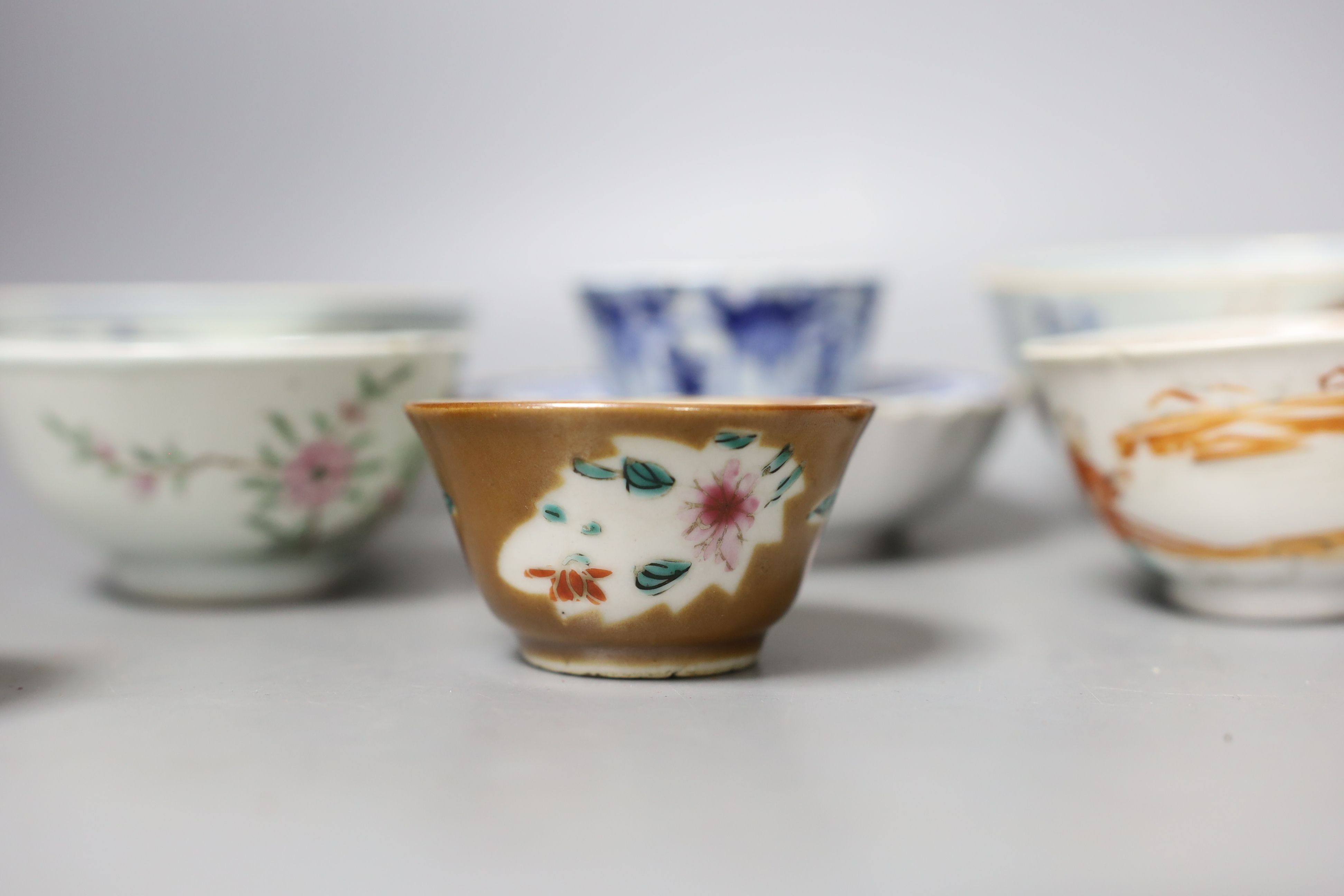 A collection of seven various 18th century and later Chinese tea and rice bowls and two saucers, a single large saucer (10)